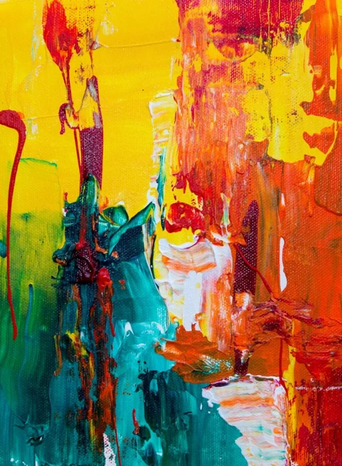An abstract palette-knife painting in yellow, red and teal